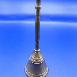 small brass dinner bell almost 5 inches tall longer handle classic shape Made in